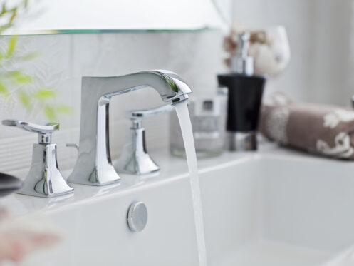 Running water in a bathroom sink in San Jose