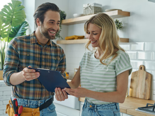 Plumber meets with his customer about a quote